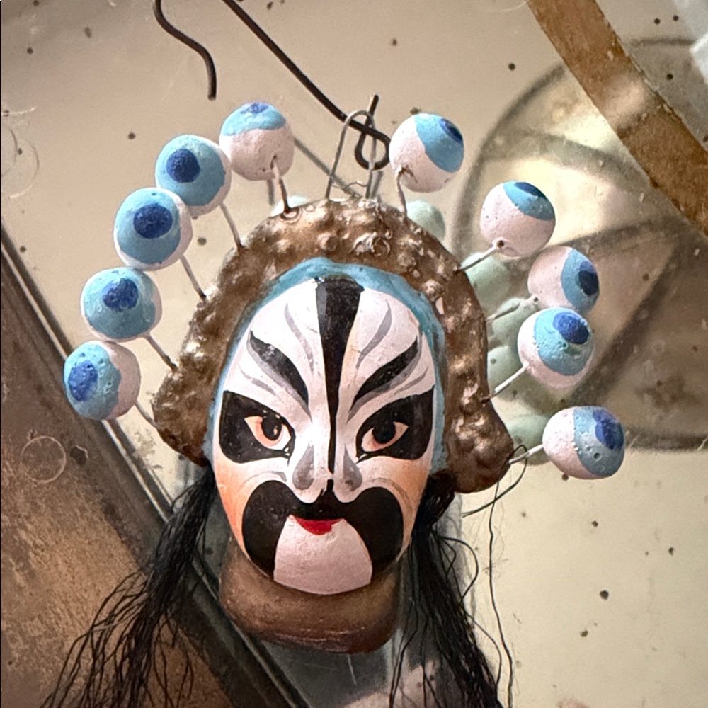 Handcrafted Mask Ornament with Blue Accents
